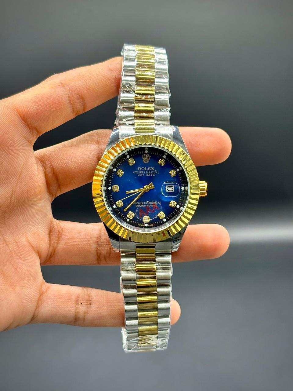 RLX Premium Steel & Gold Men’s Watch – Royal Blue Sunburst Dial | Magnified Date | Jubilee-Style Bracelet