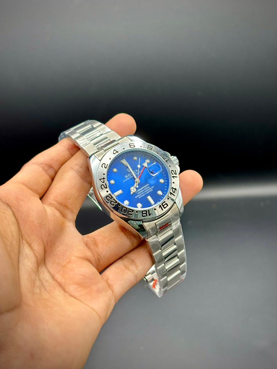 RLX Premium Steel Men’s Watch – Blue Dial | Dual-Time | Red GMT Hand | Date Window